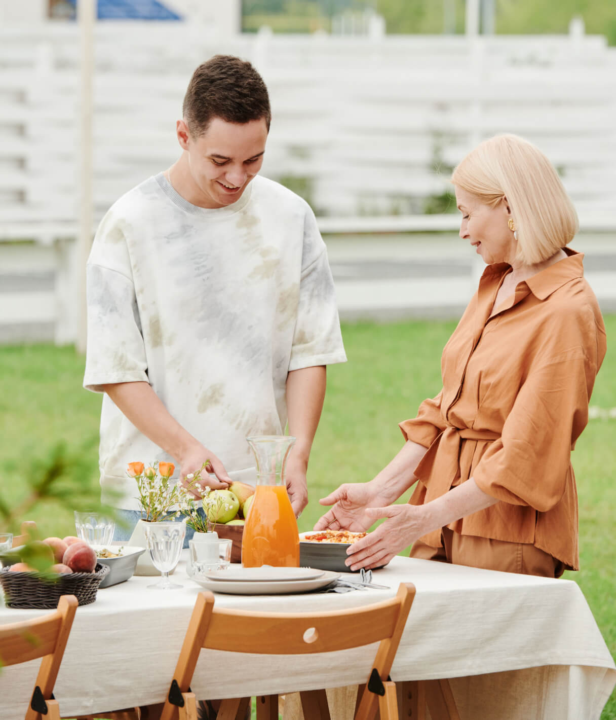 family serving food outside